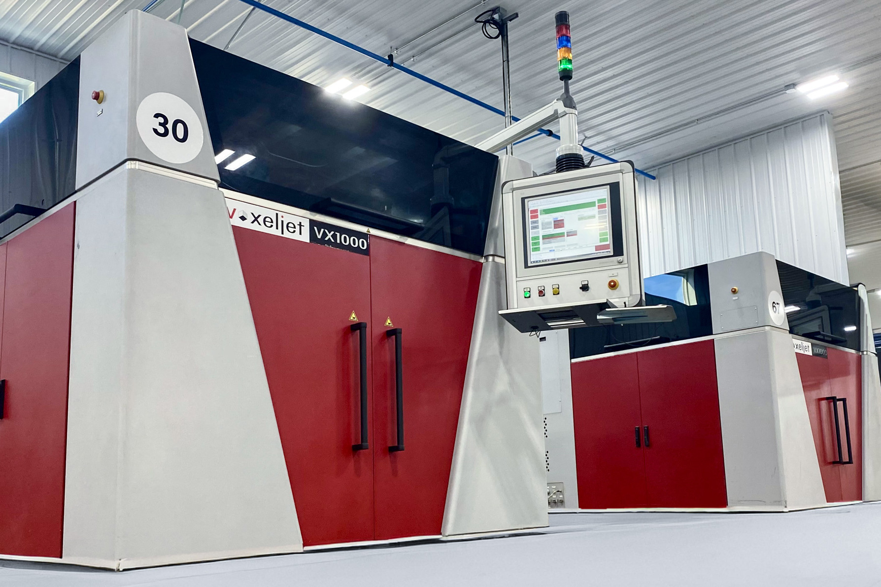 Two voxeljet 3D printers in a manufacturing hall at Liberty Pattern Company